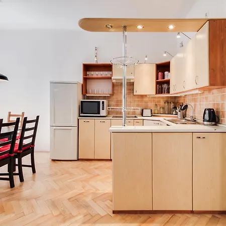 White & Woody Quadrio Apartments Apartment