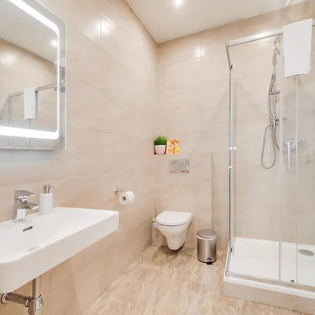 White & Woody Quadrio Apartments *