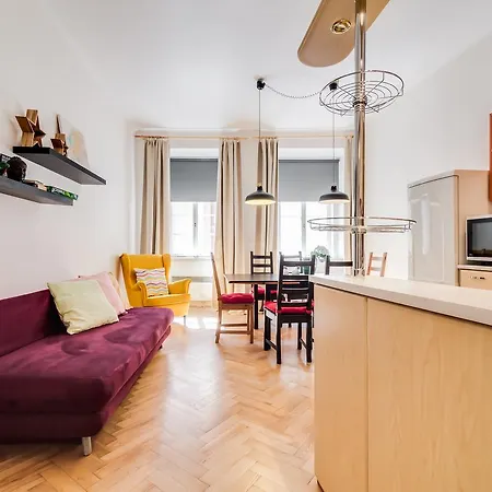 White & Woody Quadrio Apartments *